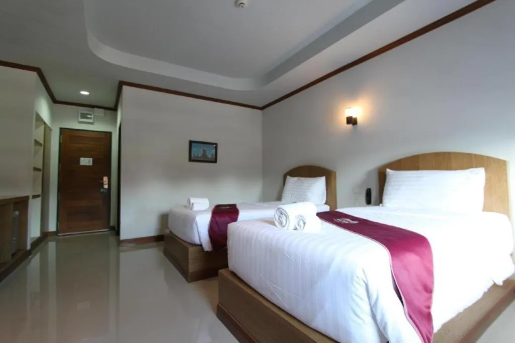 Bed in Thada Chateau Hotel