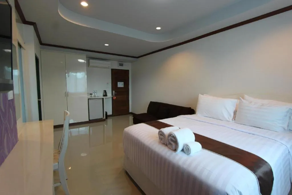 Bed in Thada Chateau Hotel