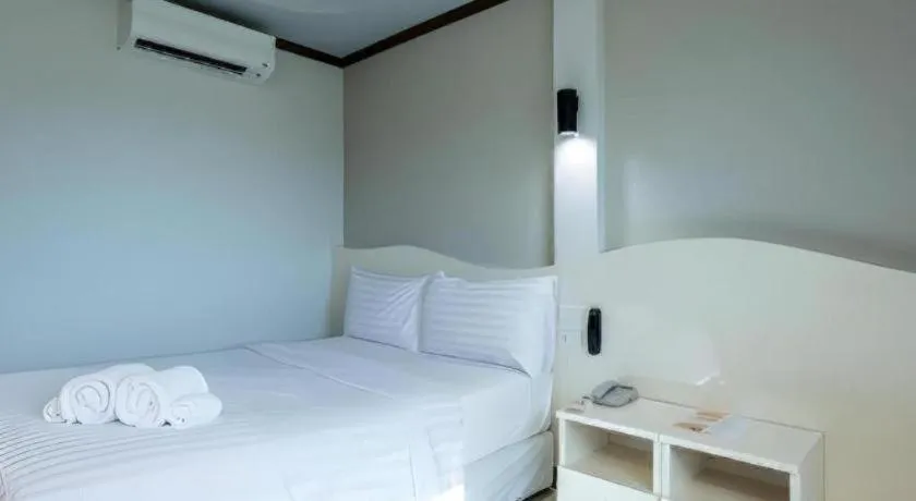 Bed in Thada Chateau Hotel