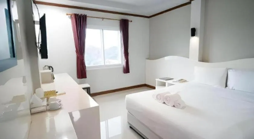 Bed in Thada Chateau Hotel