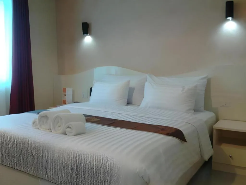 Bed in Thada Chateau Hotel