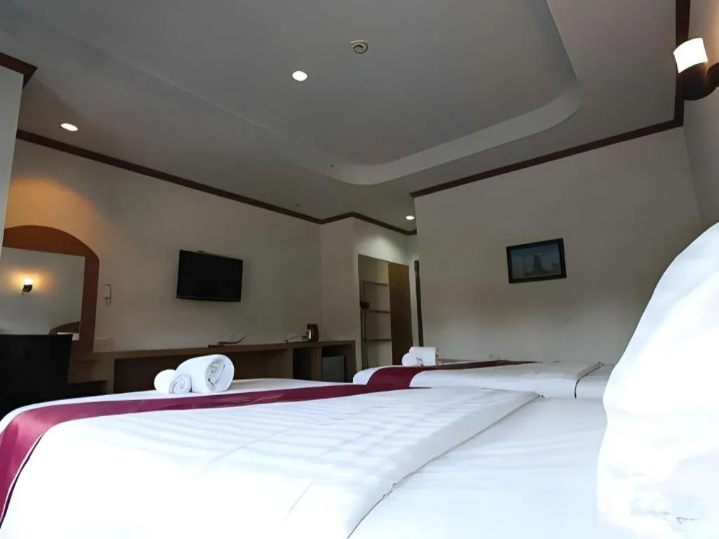 Bed in Thada Chateau Hotel