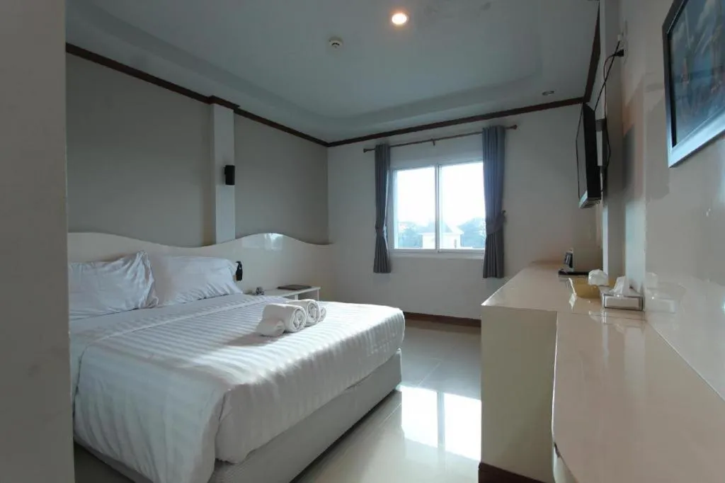 Bed in Thada Chateau Hotel