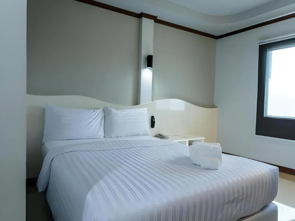 Bed in Thada Chateau Hotel