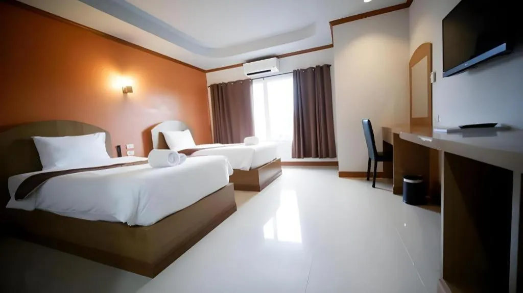 Bed in Thada Chateau Hotel