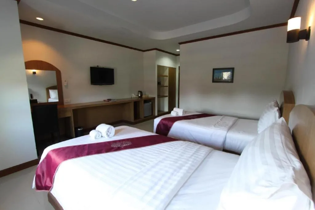 Bed in Thada Chateau Hotel