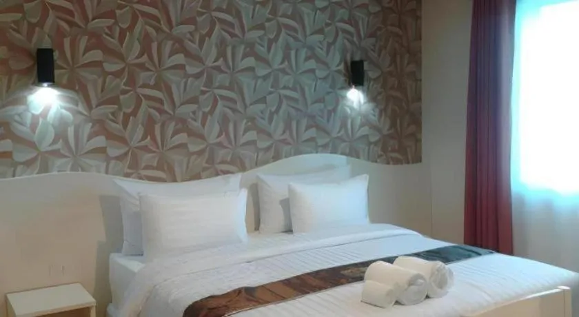 Bed in Thada Chateau Hotel