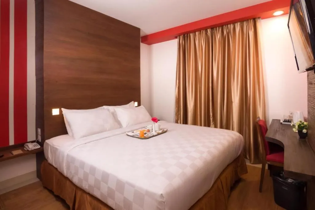 Bed in Redstar Hotel Jakarta