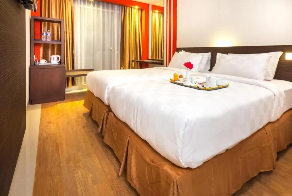 Bed in Redstar Hotel Jakarta