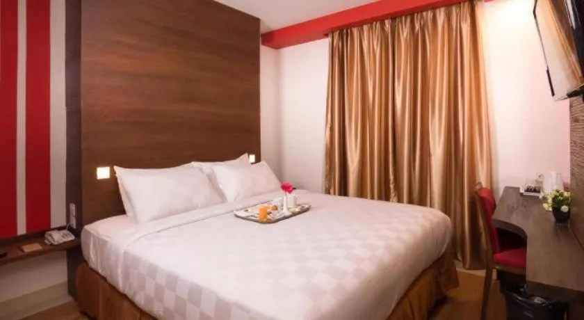 Bed in Redstar Hotel Jakarta