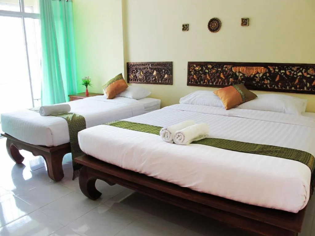 Bed in Baan Maesot Boutique Resort
