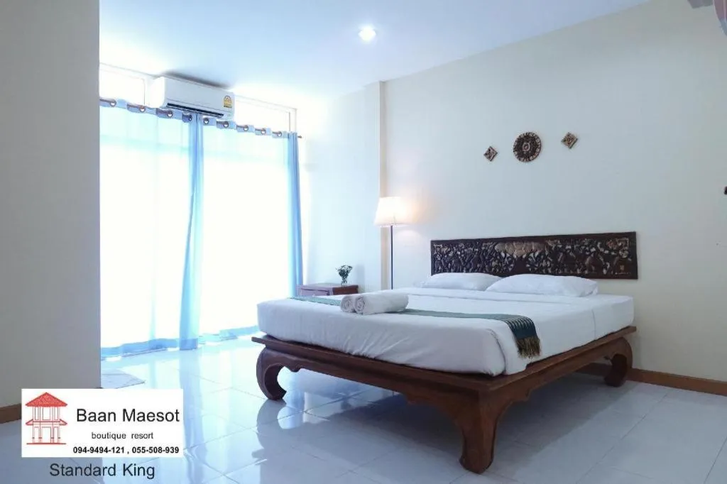 Bed in Baan Maesot Boutique Resort