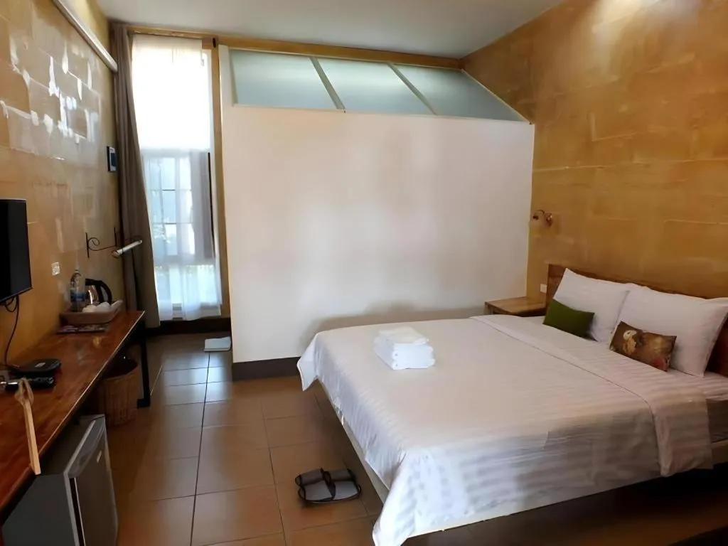 Bed in Villa Tuscany Country Resort