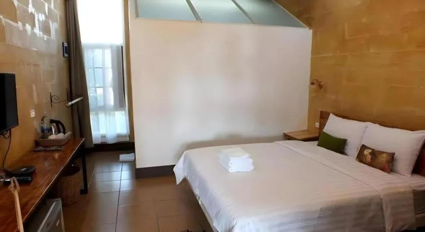 Bed in Villa Tuscany Country Resort