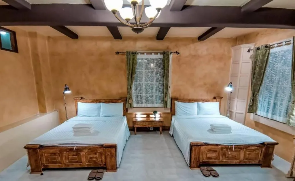 Bed in Villa Tuscany Country Resort