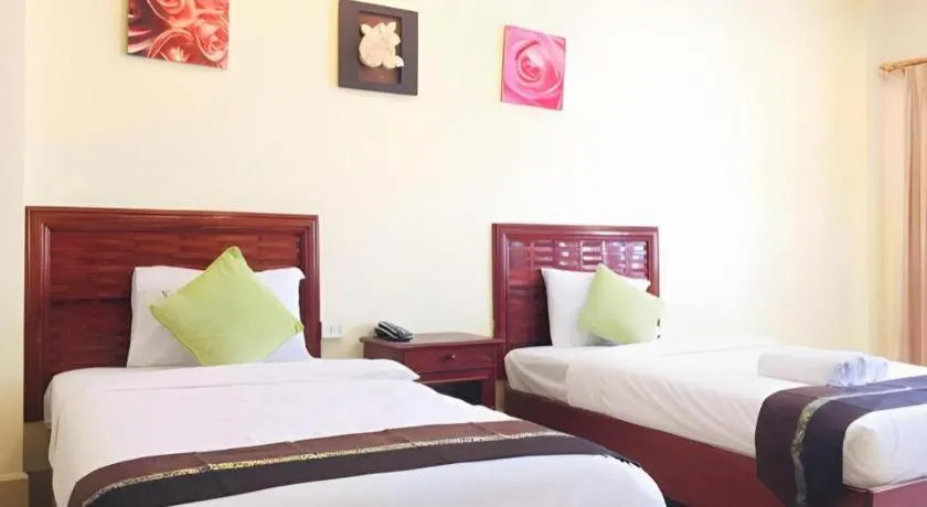 Bed in New Rose Boutique Hotel