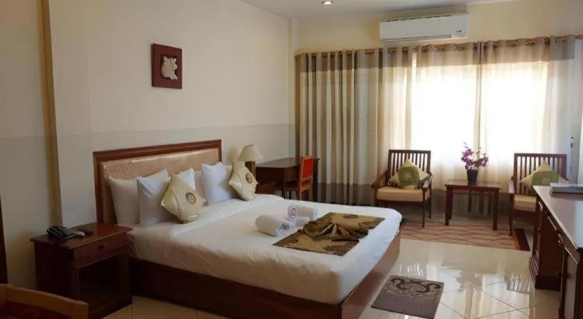 Bed in New Rose Boutique Hotel