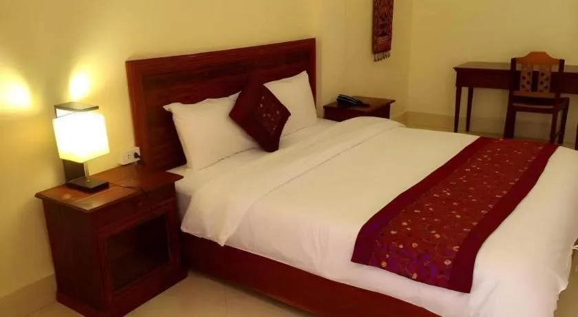 Bed in New Rose Boutique Hotel