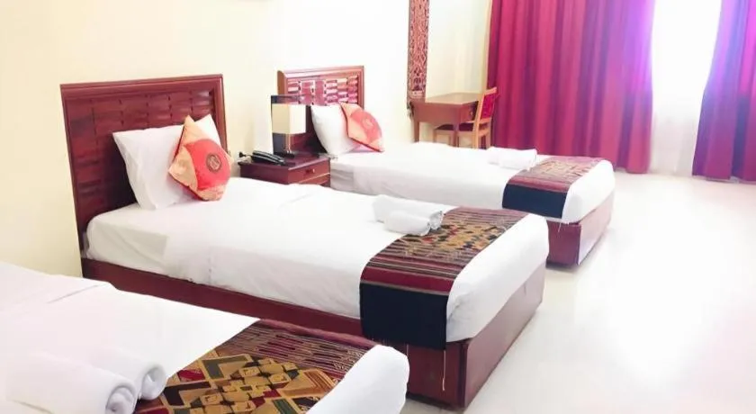 Bed in New Rose Boutique Hotel