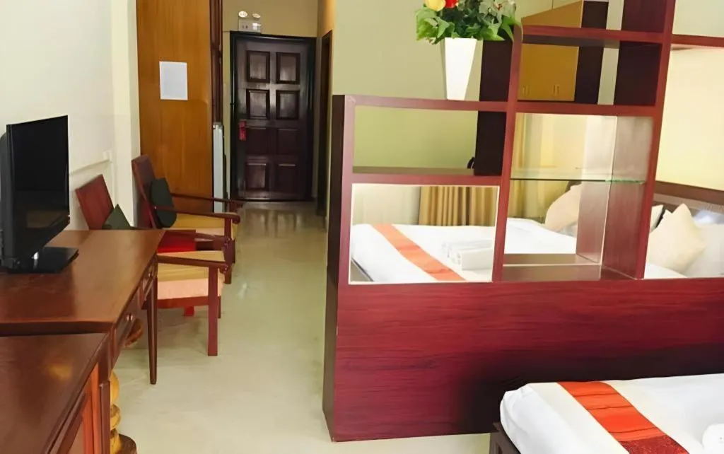 Bed in New Rose Boutique Hotel