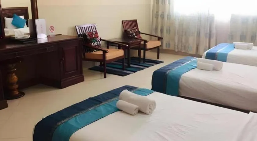 Bed in New Rose Boutique Hotel