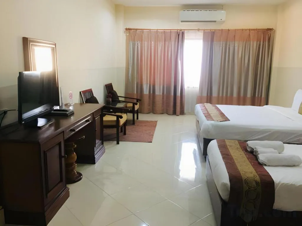 Bed in New Rose Boutique Hotel