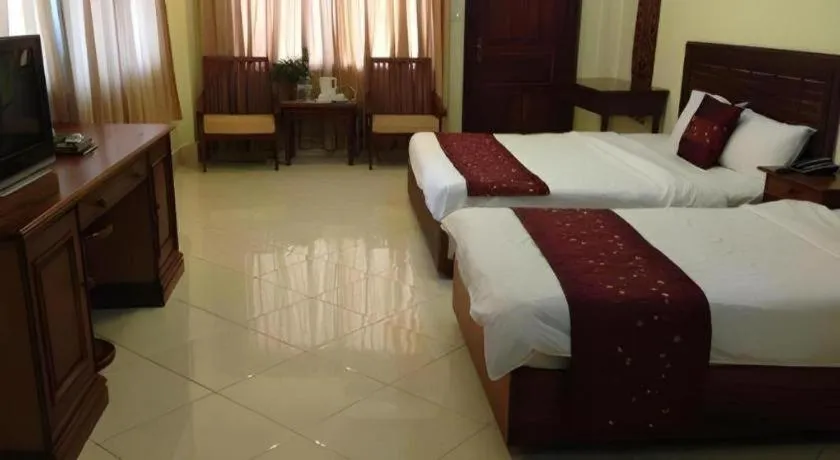 Bed in New Rose Boutique Hotel