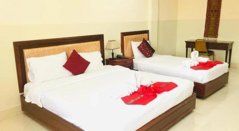 Bed in New Rose Boutique Hotel