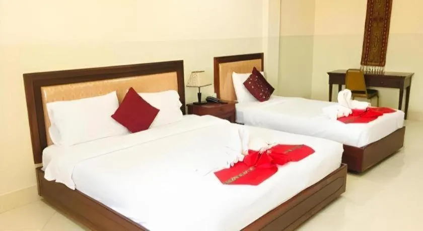 Bed in New Rose Boutique Hotel