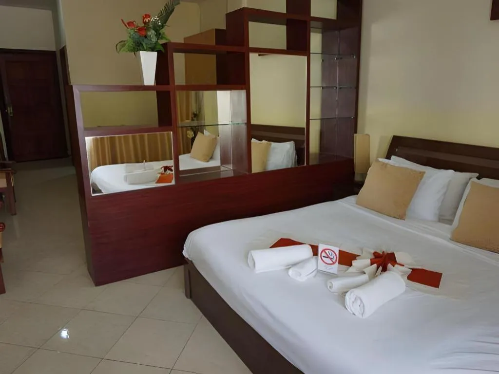 Bed in New Rose Boutique Hotel