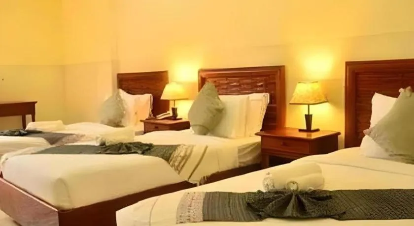 Bed in New Rose Boutique Hotel