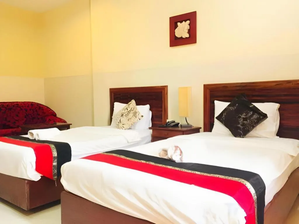 Bed in New Rose Boutique Hotel