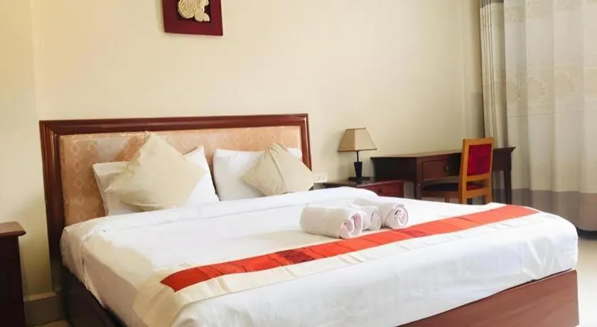 Bed in New Rose Boutique Hotel