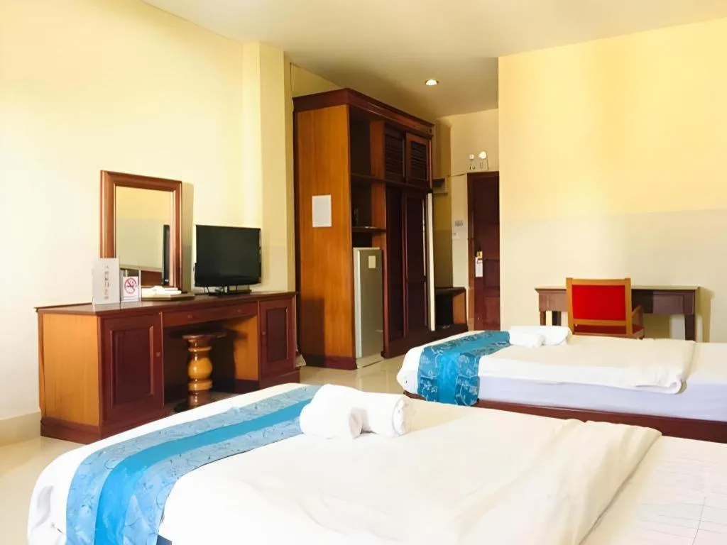 Bed in New Rose Boutique Hotel