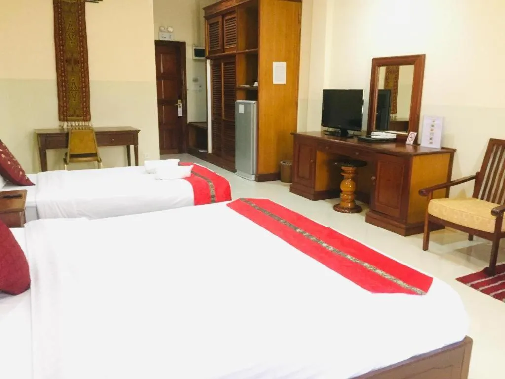 Bed in New Rose Boutique Hotel