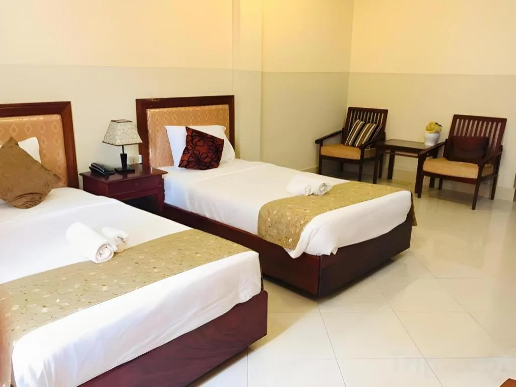 Bed in New Rose Boutique Hotel