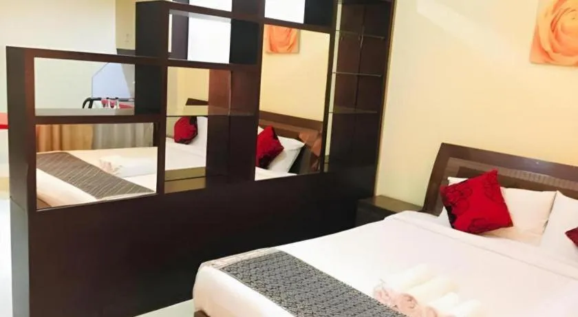 Bed in New Rose Boutique Hotel