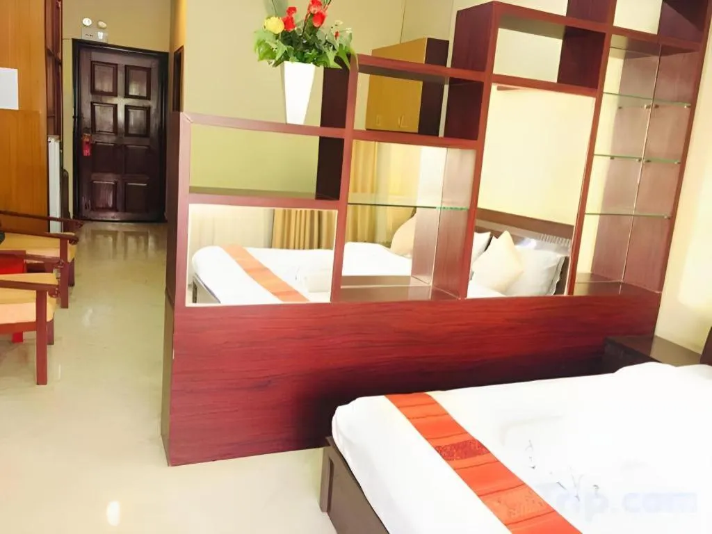 Bed in New Rose Boutique Hotel