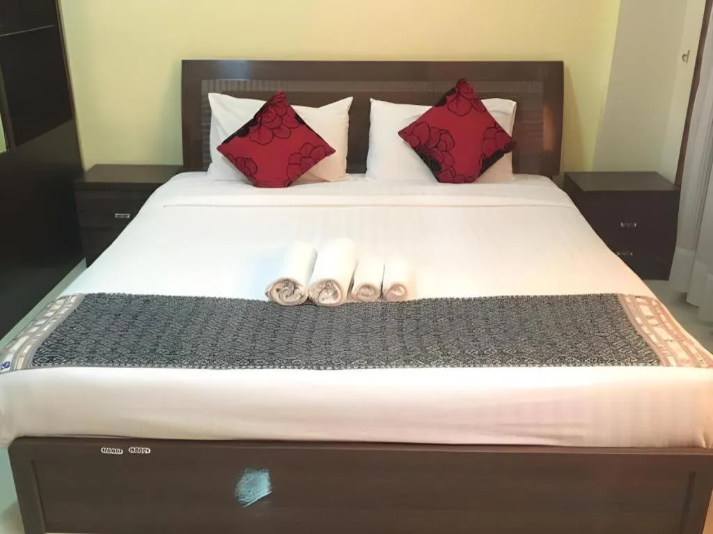Bed in New Rose Boutique Hotel