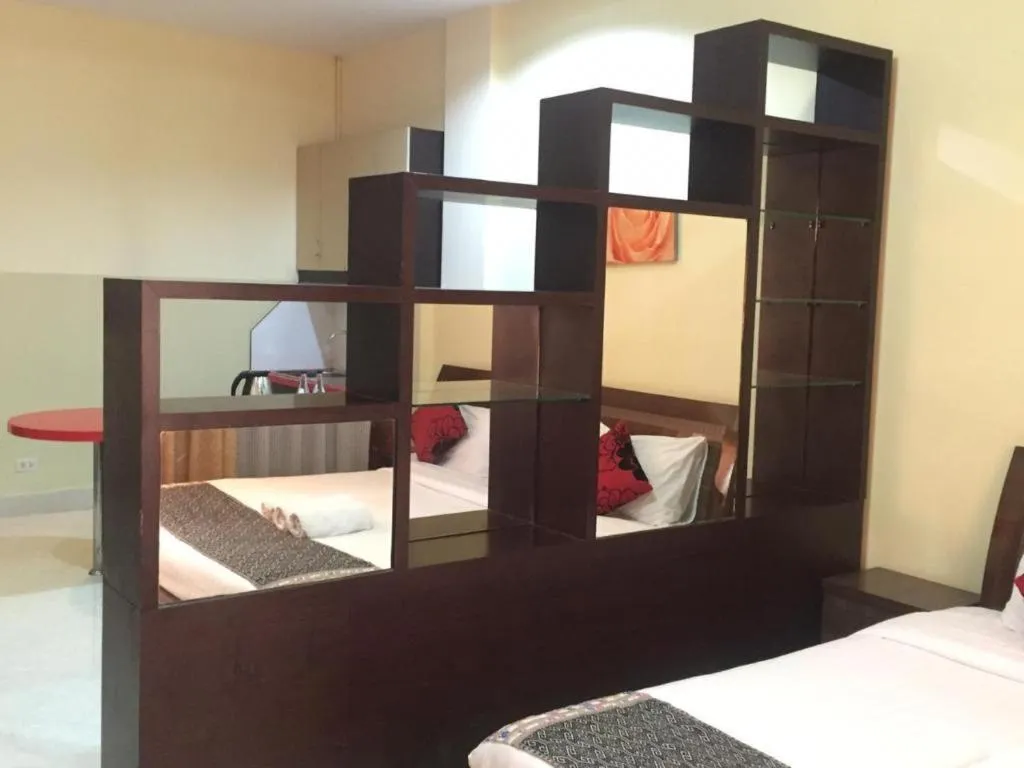 Bed in New Rose Boutique Hotel