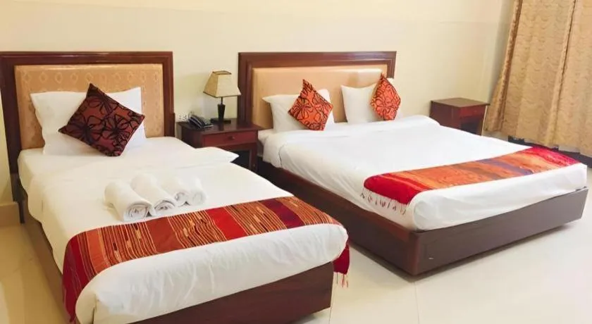 Bed in New Rose Boutique Hotel