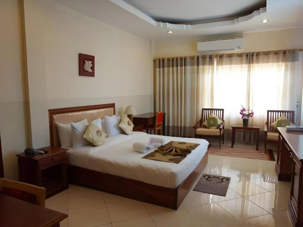 Bed in New Rose Boutique Hotel