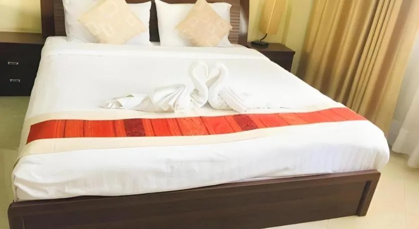 Bed in New Rose Boutique Hotel
