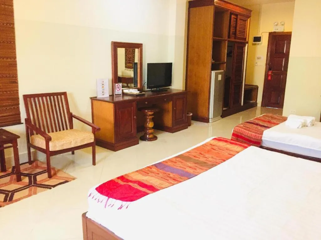 Bed in New Rose Boutique Hotel