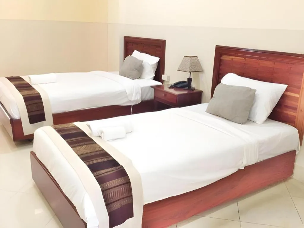 Bed in New Rose Boutique Hotel