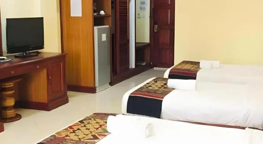 Bed in New Rose Boutique Hotel