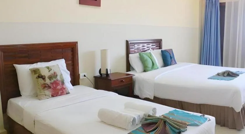 Bed in New Rose Boutique Hotel