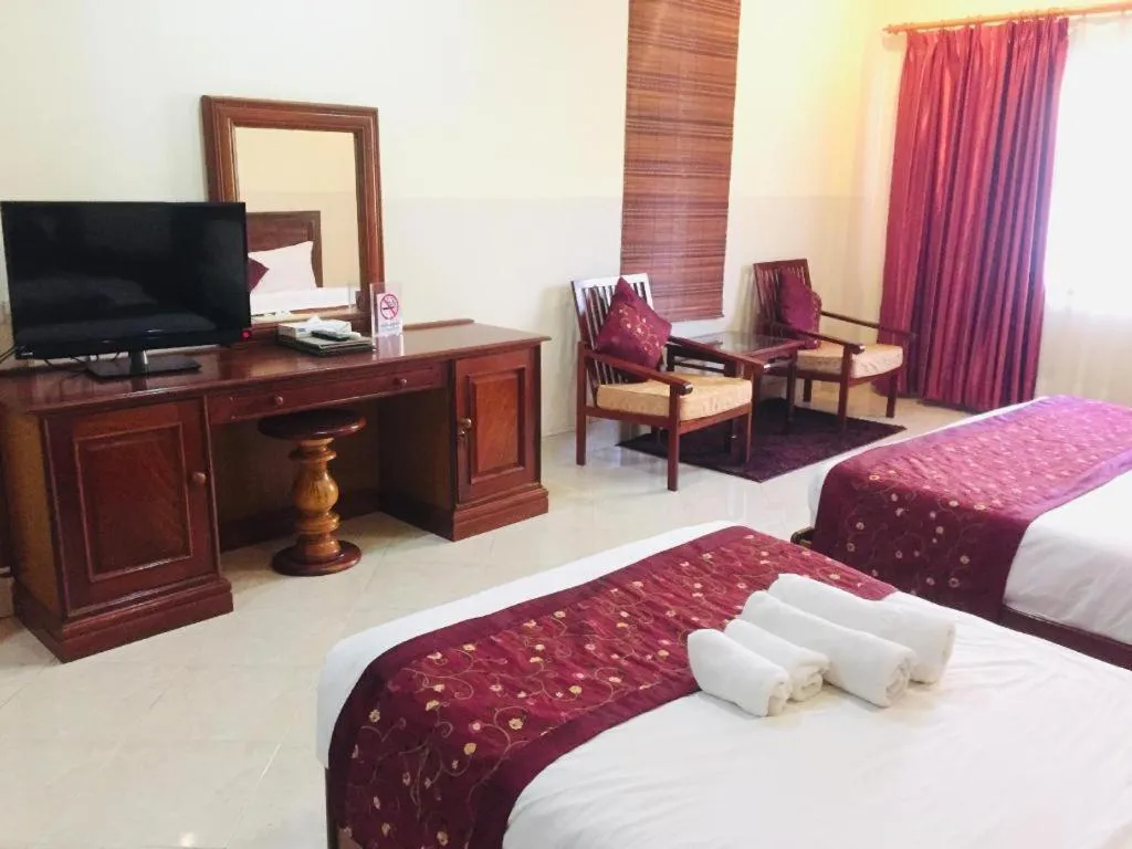 Bed in New Rose Boutique Hotel