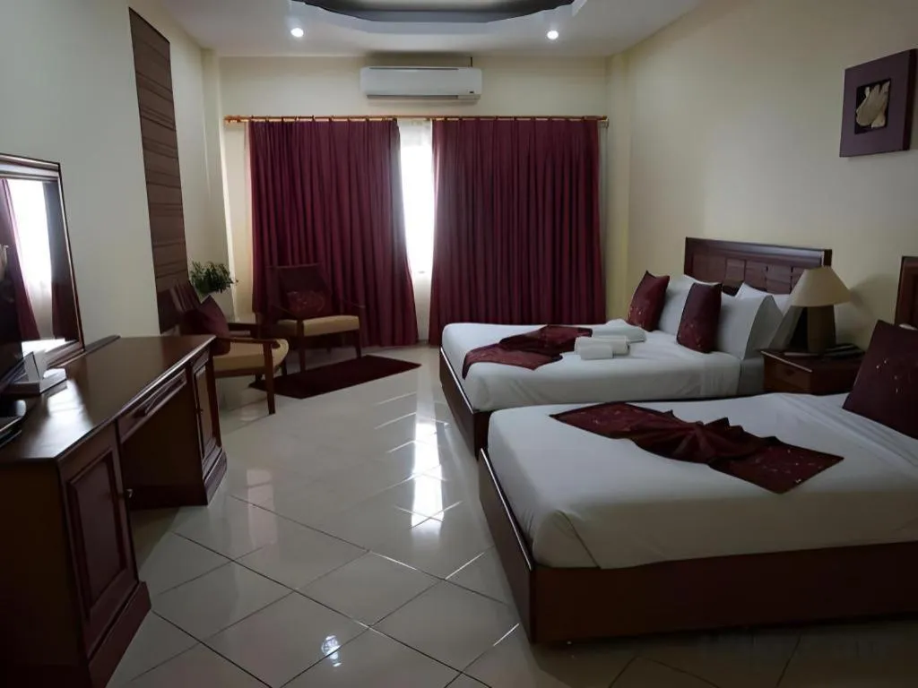 Bed in New Rose Boutique Hotel