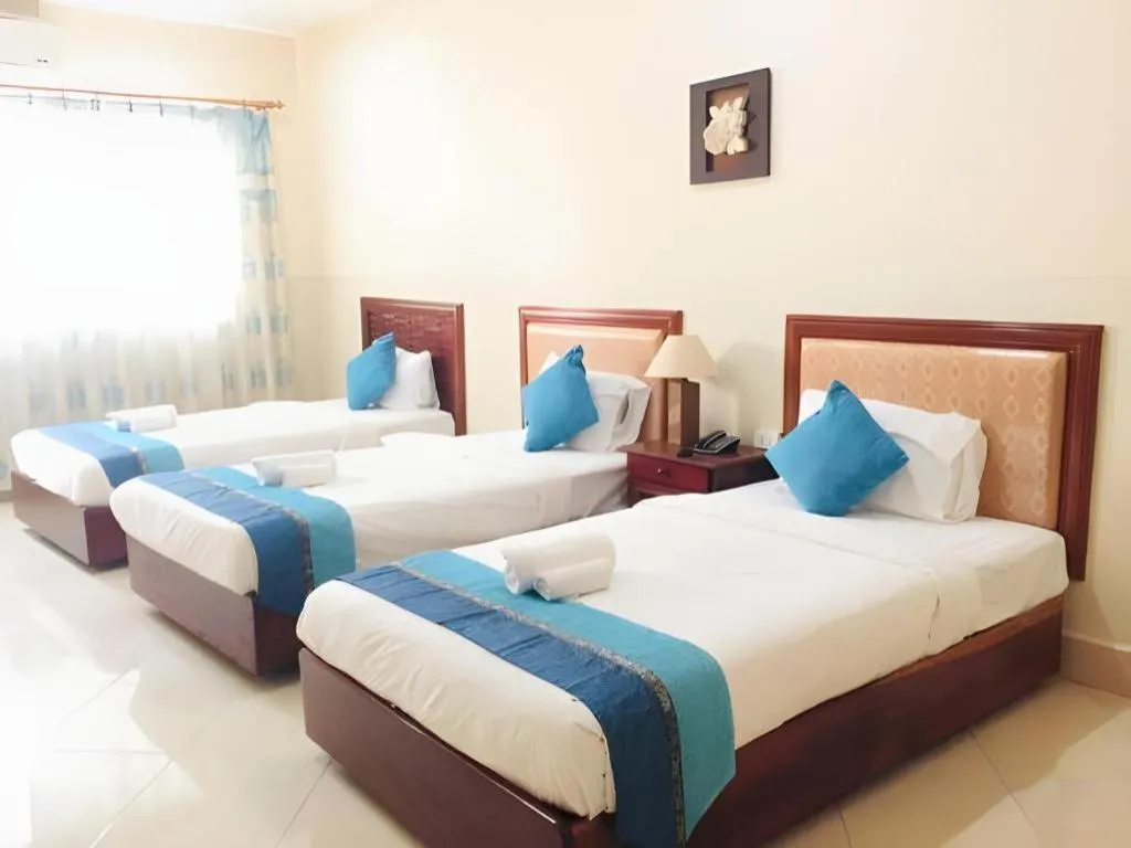 Bed in New Rose Boutique Hotel